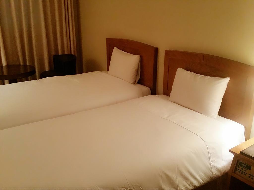 Daedong Hotel Чеджудо Номер фото