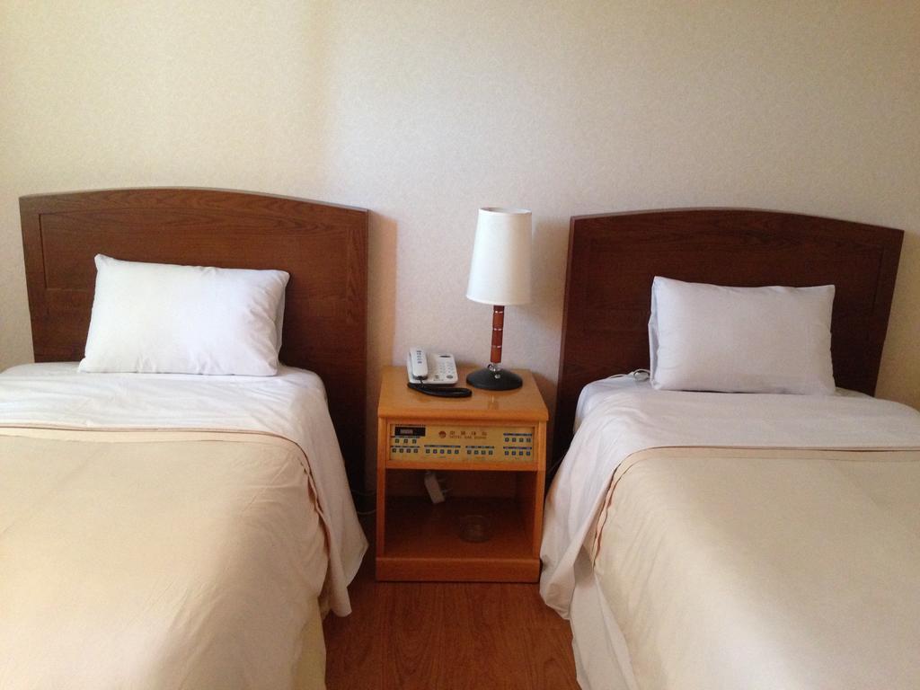 Daedong Hotel Чеджудо Номер фото