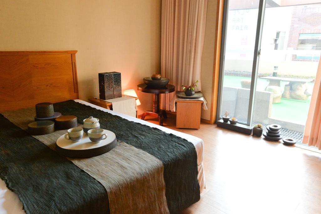 Daedong Hotel Чеджудо Номер фото